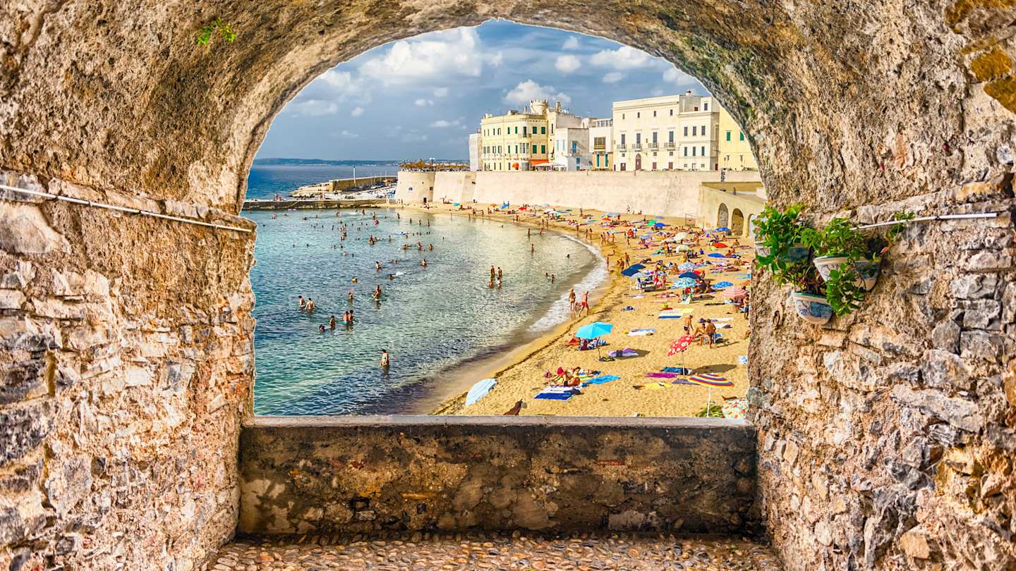 Rock balcony overlooking Gallipoli waterfront in Apulia, Italy