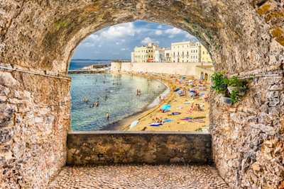 Rock balcony overlooking Gallipoli waterfront in Apulia, Italy