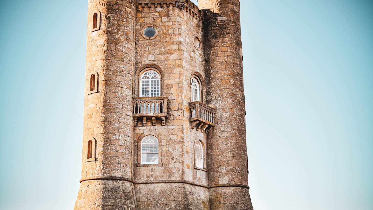 A view of Broadway Tower against a blue sky, Worcestershire, England, UK