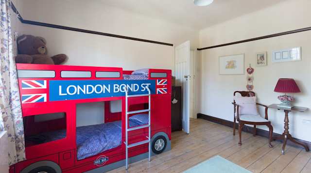 Let your kids go wild and sleep in a real double decker london bus