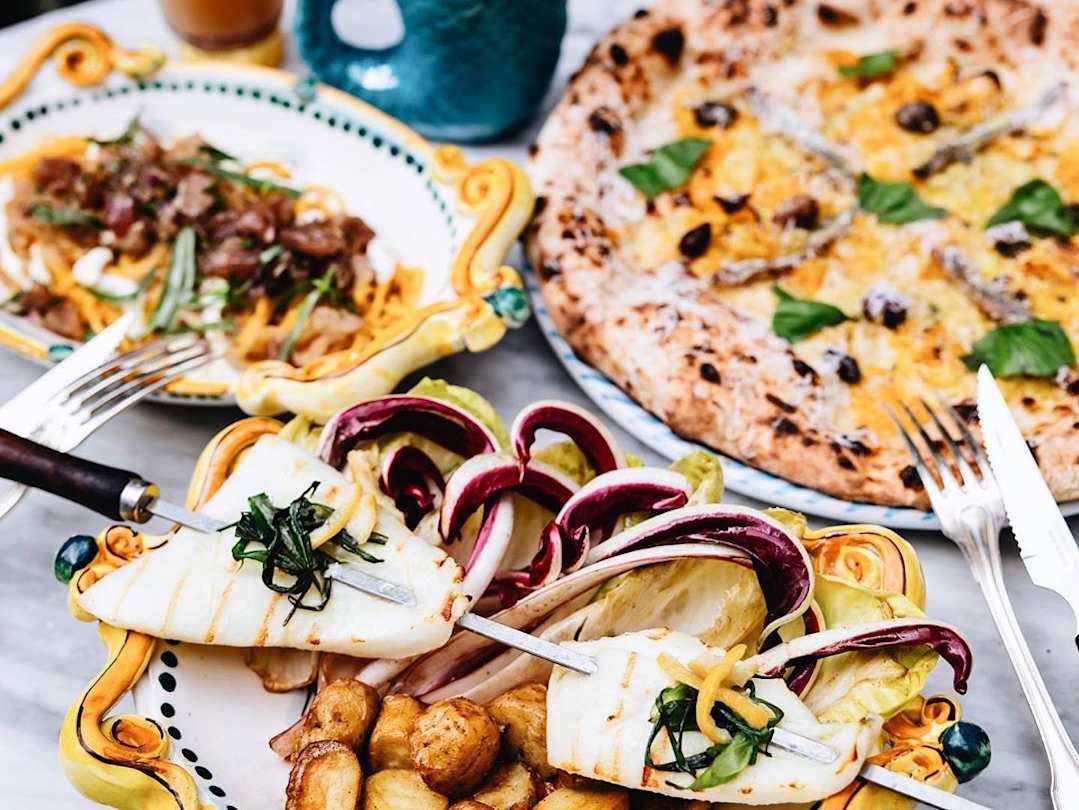 Dishes of food from Big Mamma restaurant, London