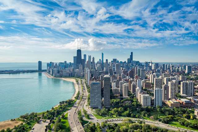 An aerial view of the city skyline with skyscrapers in summer, Chicago, USA