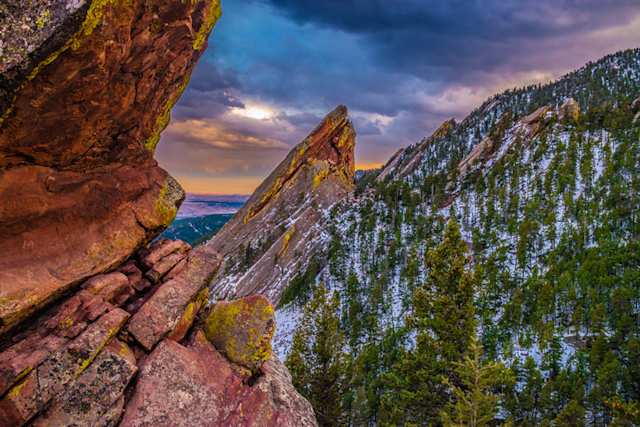 A view of large cliffs at the Flatirons at sunset, Boulder, Colorado, USA