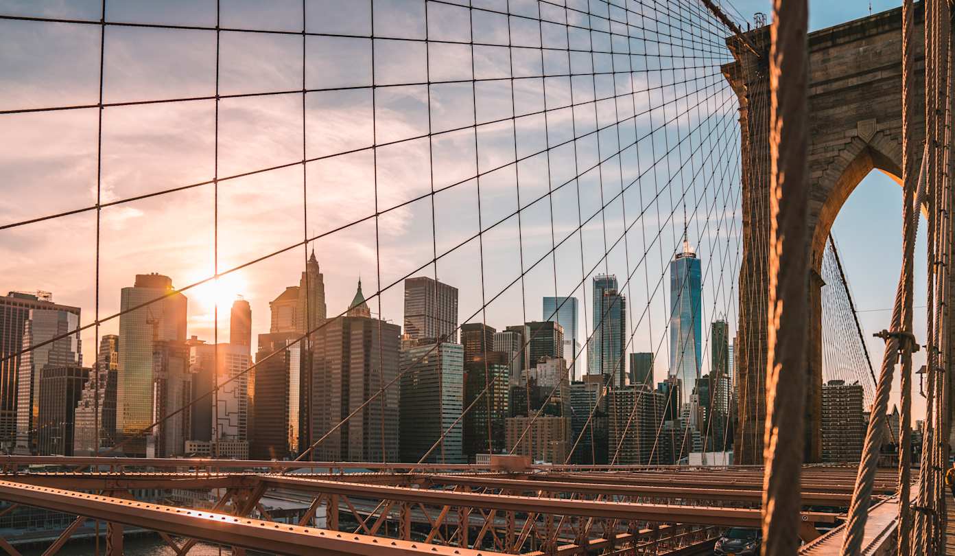 Manhattan skyline at sunset captured from the Brooklyn Bridge 