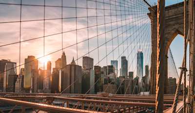 Manhattan skyline at sunset captured from the Brooklyn Bridge 