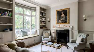 A cosy living room with lots of light