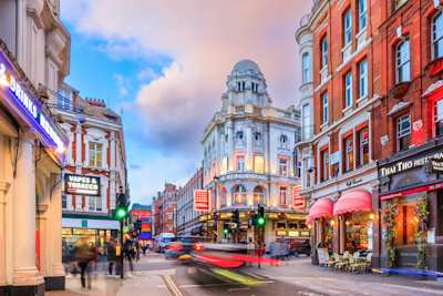 West End theatres on Shaftesbury Avenue at night, London