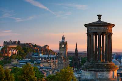 The skyline of Old Town city centre at sunset, as seen from to top of seen from Calton Hill, Edinburgh