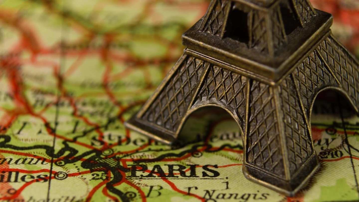 Map of Paris with an Eiffel Tower trinket