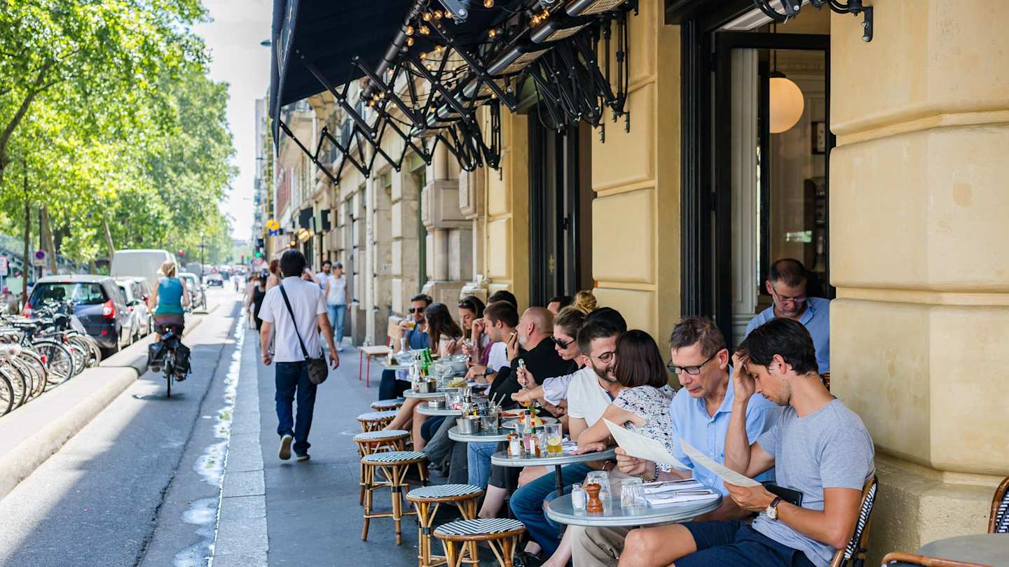 People eating at a Paris bistro