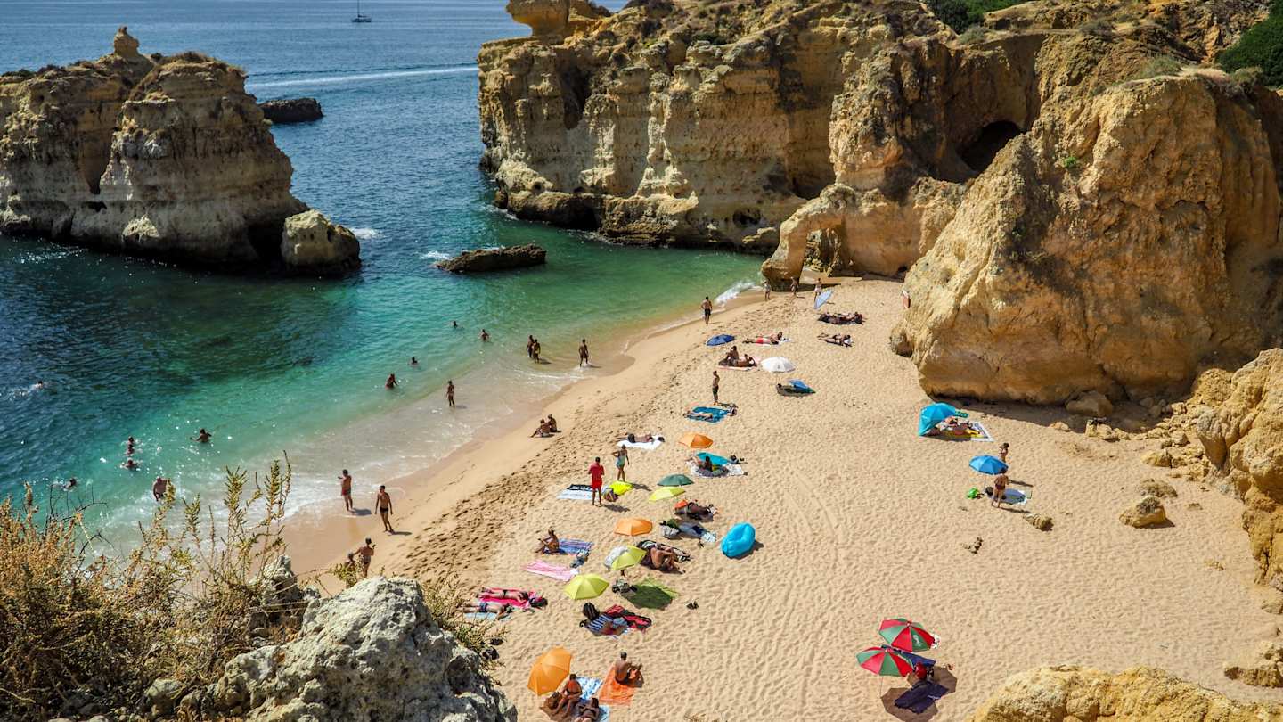 People at a beach in Algarve, Portugal