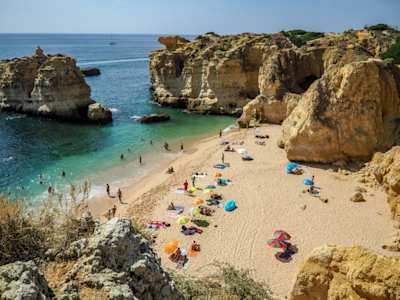 People at a beach in Algarve, Portugal