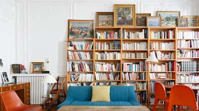 Living room with bookshelf against wall
