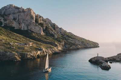 A boat on the water at dusk in the Côte D'Azur, Marseille, France