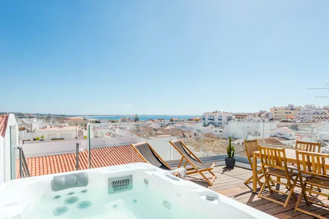 Caipirinhas on the Roof, Plum Guide home in Lagos, Portugal