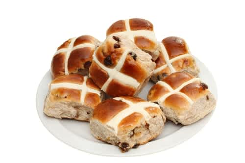 Hot cross buns contain raisins, which are toxic to dogs