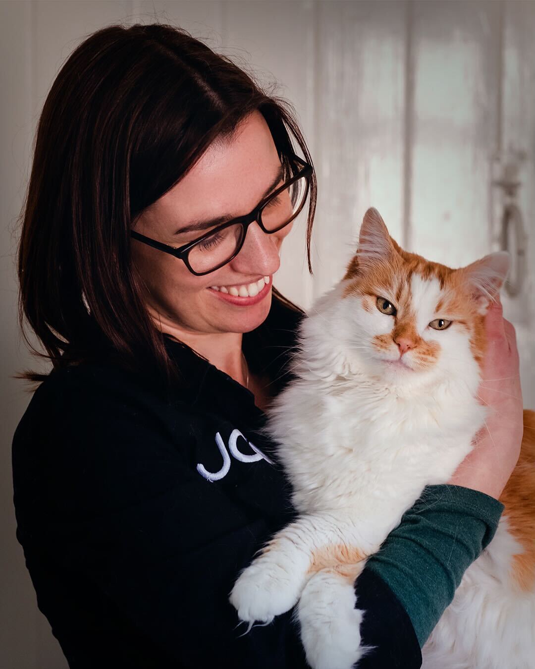 Ella, one of our Joii Vets, with Mr T the cat