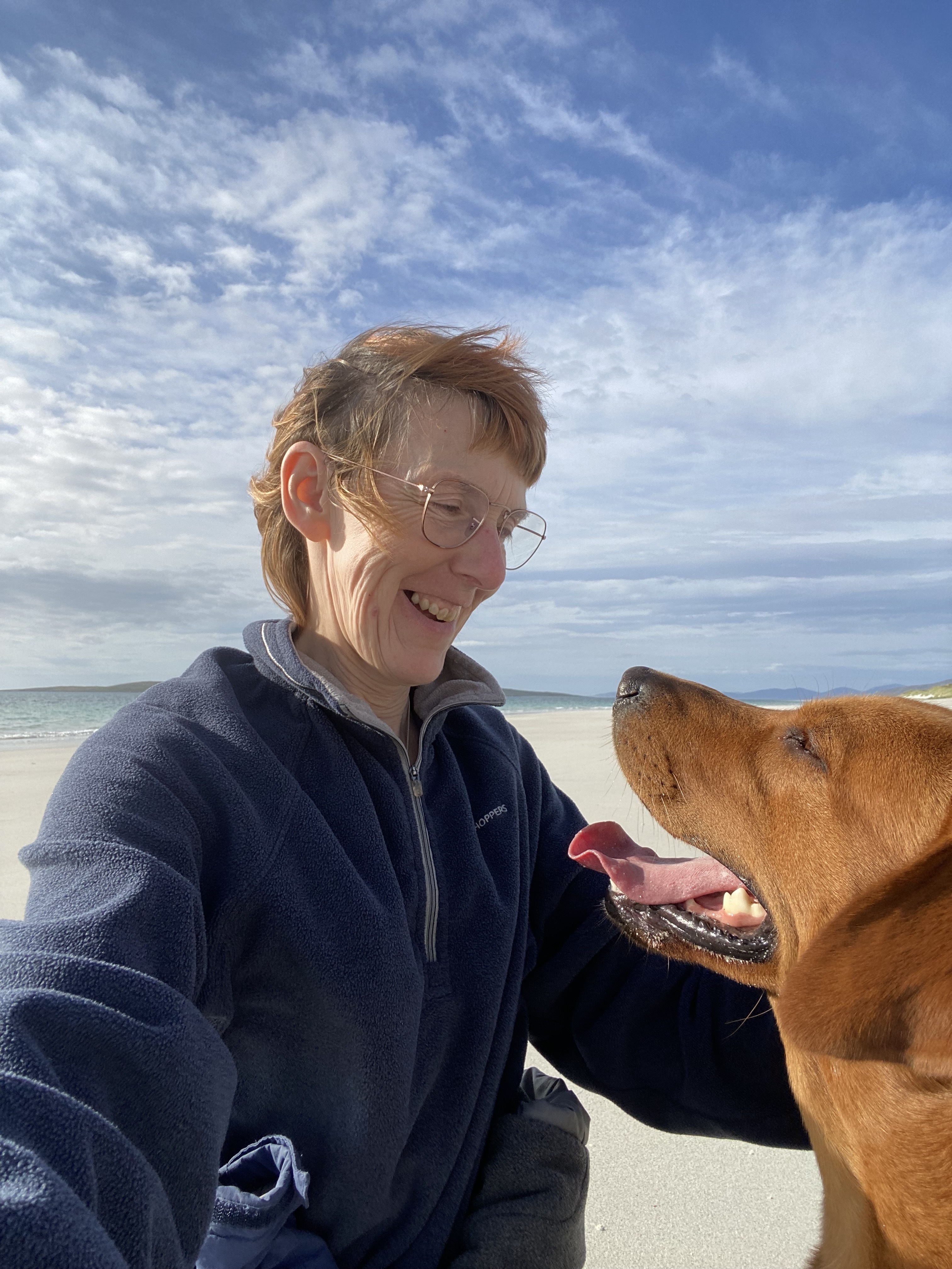 Not all work! Deb, our author, and her Labrador Bungee enjoying a well-earned beach day.