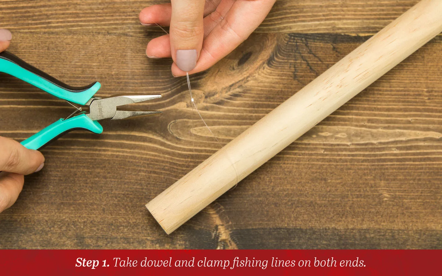 Step 1: Take dowel and clamp fishing lines on both ends.