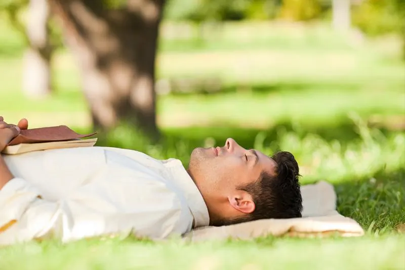 Allergy-Guide-man-laying-on-grass
