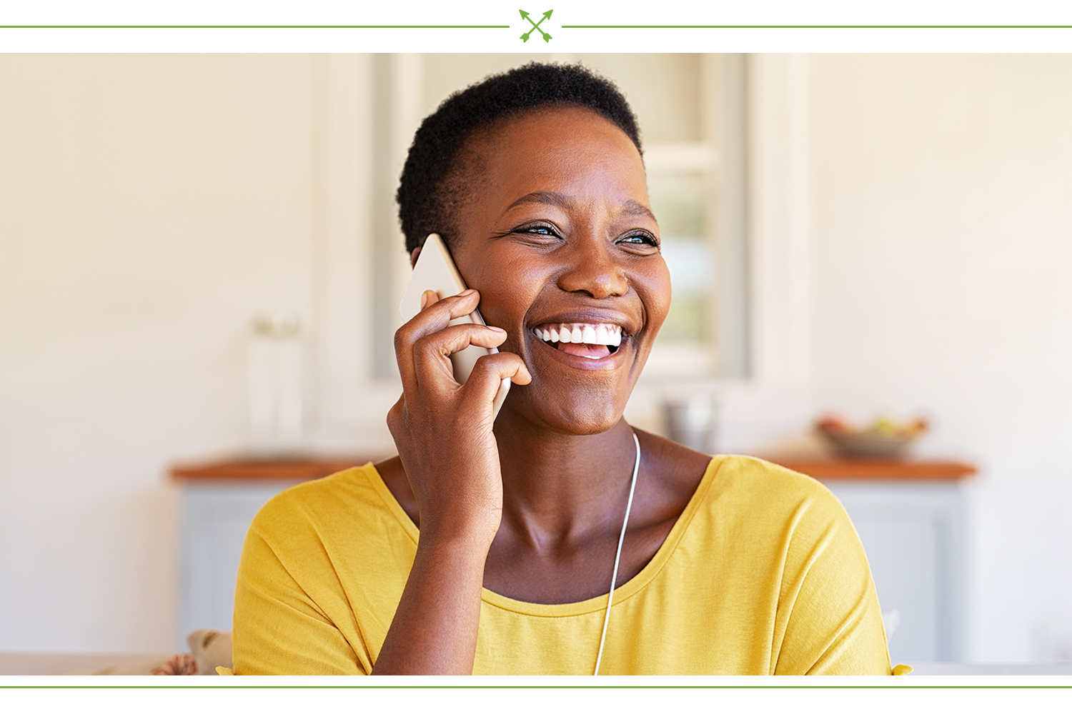 women talking on phone and smiling