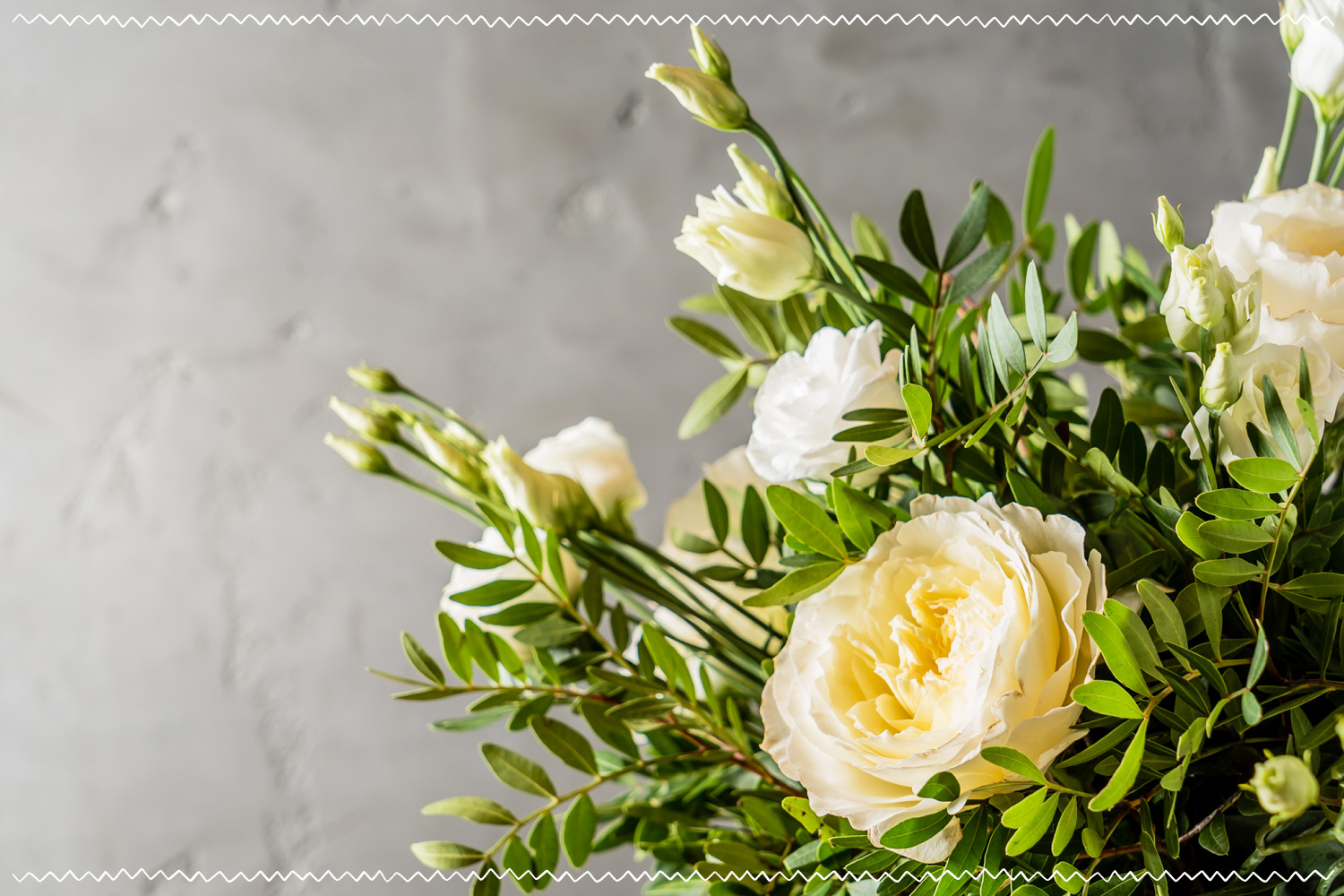 white flowers on grey background