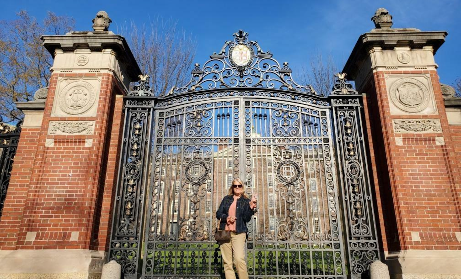 Photo of David and Mark Baiada shaking hands next to a headshot photo of Mark Baiada