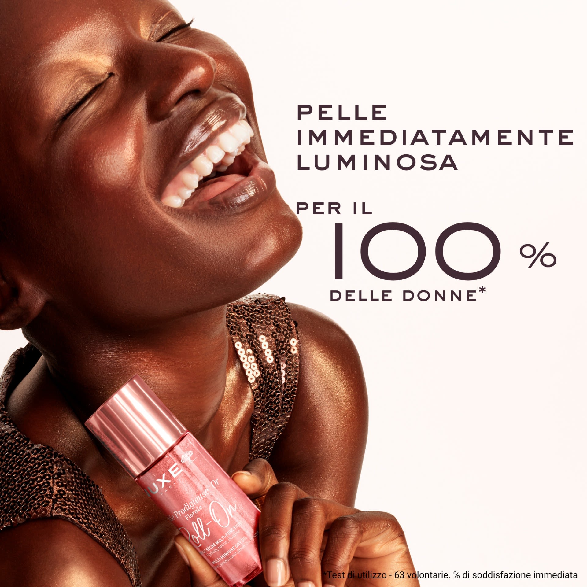 image - 951990718 - Olio secco multifunzione con microperle dorate in formato roll-on, nutre e illumina viso, corpo e capelli con una delicata fragranza floreale. Texture leggera per una pelle luminosa e sublimata. - 4865529_5.jpg