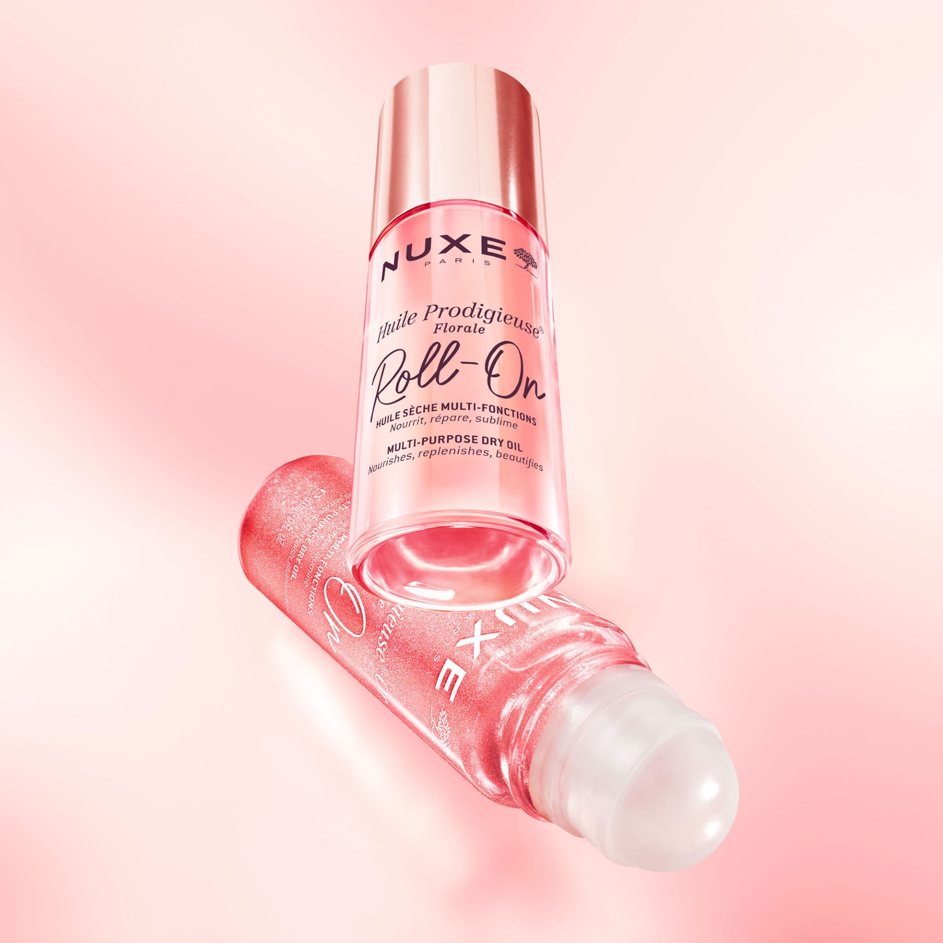 image - 951990720 - Olio secco multifunzione in formato roll-on, nutre e illumina viso, corpo e capelli con una delicata fragranza floreale. Texture leggera a rapido assorbimento per una pelle morbida e radiosa. - 4865530_6.jpg