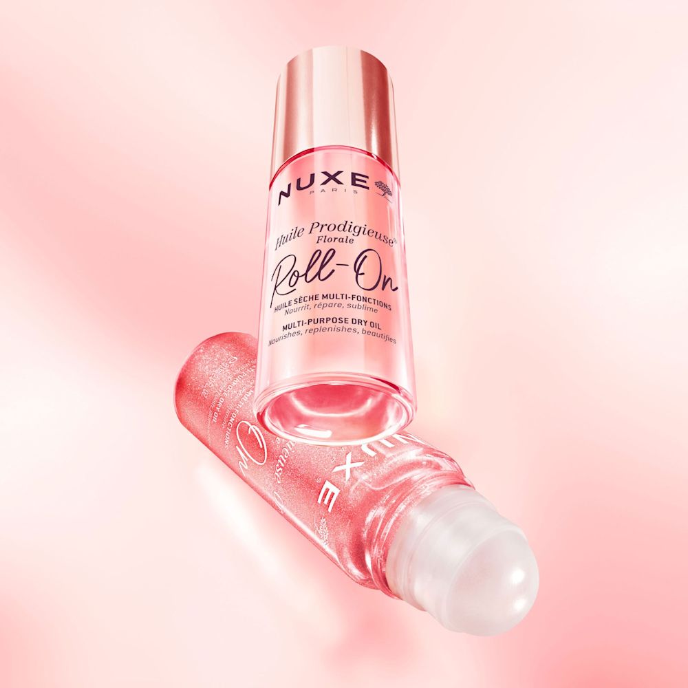 image - 951990718 - Olio secco multifunzione con microperle dorate in formato roll-on, nutre e illumina viso, corpo e capelli con una delicata fragranza floreale. Texture leggera per una pelle luminosa e sublimata. - 4865529_7.jpg