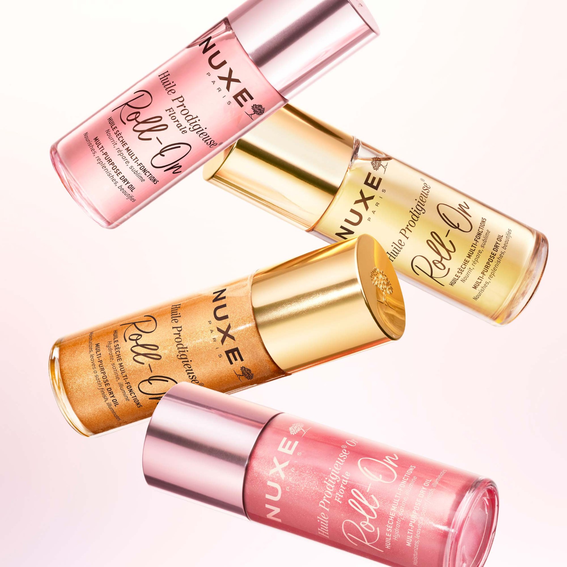 image - 951990718 - Olio secco multifunzione con microperle dorate in formato roll-on, nutre e illumina viso, corpo e capelli con una delicata fragranza floreale. Texture leggera per una pelle luminosa e sublimata. - 4865529_9.jpg