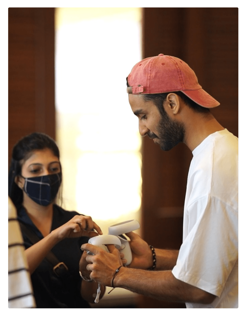 Raghav Juyal Using the virtual reality headset controller