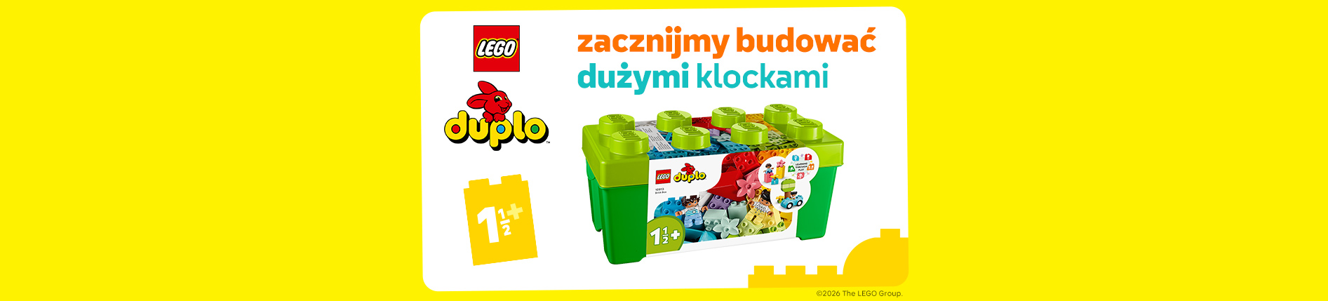 Banner LEGO DUPLO z hasłem „Zacznijmy budować dużymi klockami”. Na żółtym tle zestaw kolorowych klocków DUPLO w zielonym pudełku, przeznaczony dla dzieci od 1,5 roku.