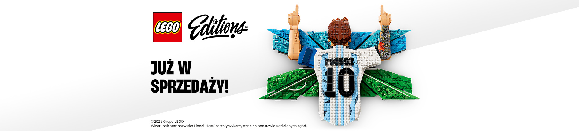 Baner reklamowy LEGO Editions z minifigurką Messiego w koszulce z numerem 10, podnoszącą ręce w geście triumfu. Obok tekst "JUŻ W SPRZEDAŻY!". Tło białe z elementami LEGO.