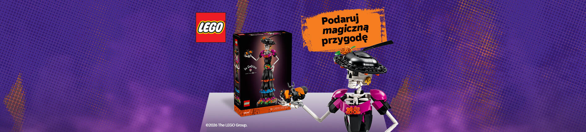 Baner LEGO z hasłem „Podaruj magiczną przygodę”. Na fioletowym tle widoczne logo LEGO, pudełko zestawu LEGO Ideas La Catrina oraz kolorowa figurka szkieletu w czarnym kapeluszu i stroju z różowymi elementami, trzymająca kwiat. Po prawej przycisk „Sprawdź”.