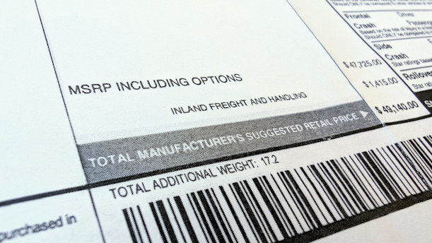 photo of the MSRP on a car's window sticker