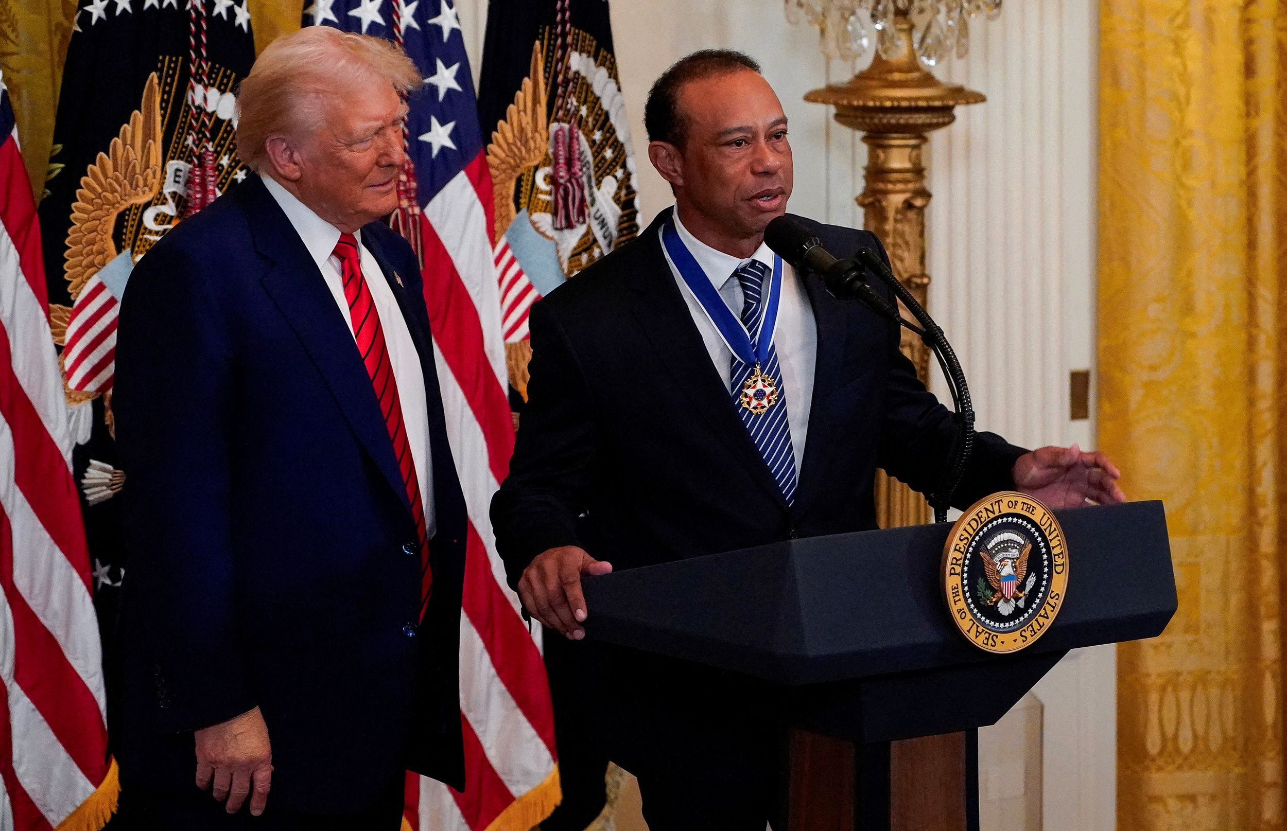 Au côté de Tiger Woods, Donald Trump encense la communauté afro ...
