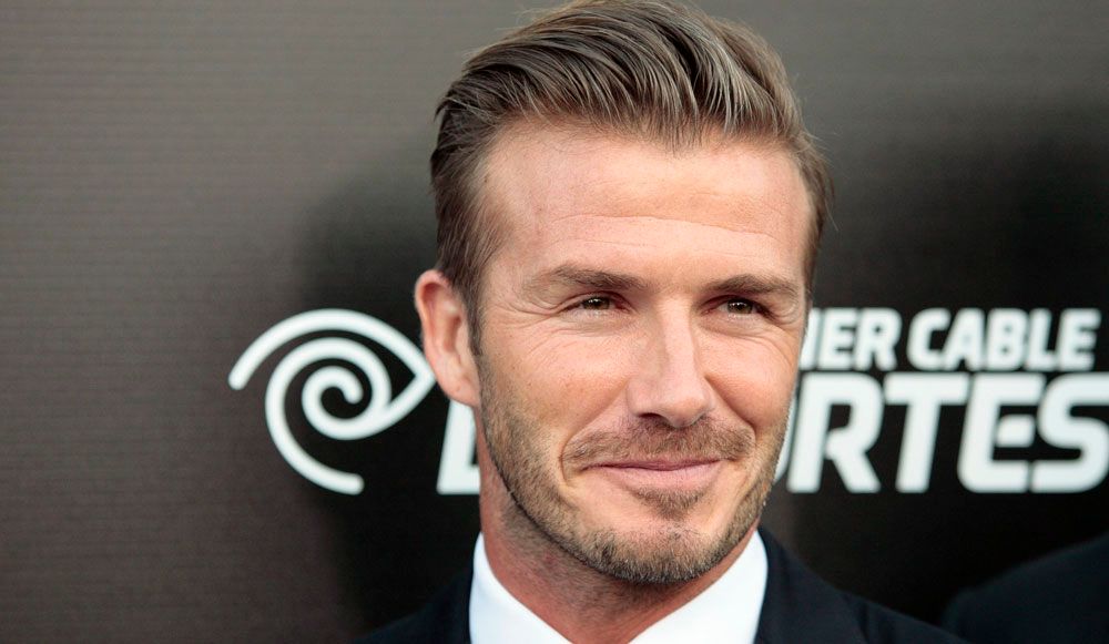 David Beckham surpris à demi-nu par des touristes