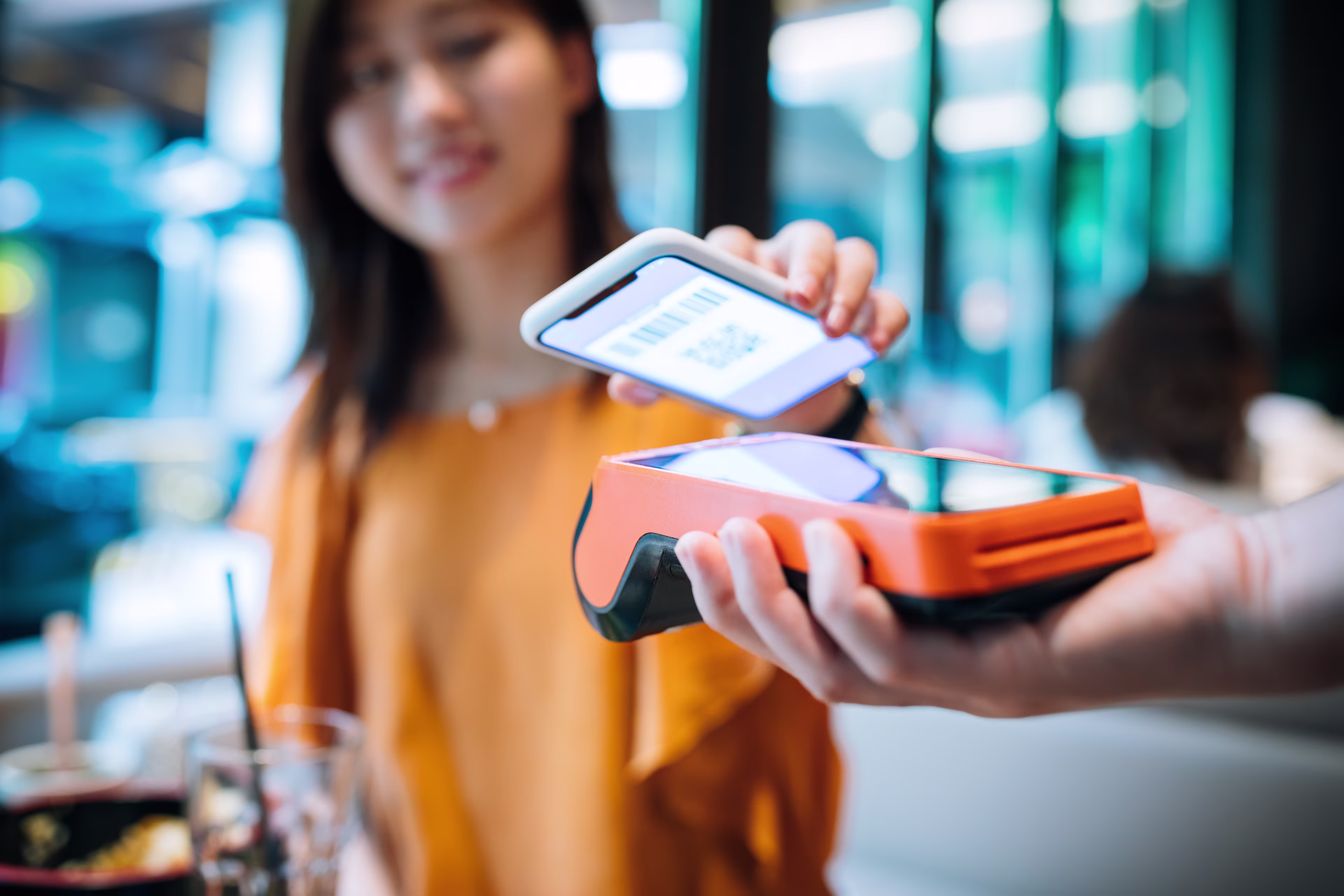 Woman Paying Phone