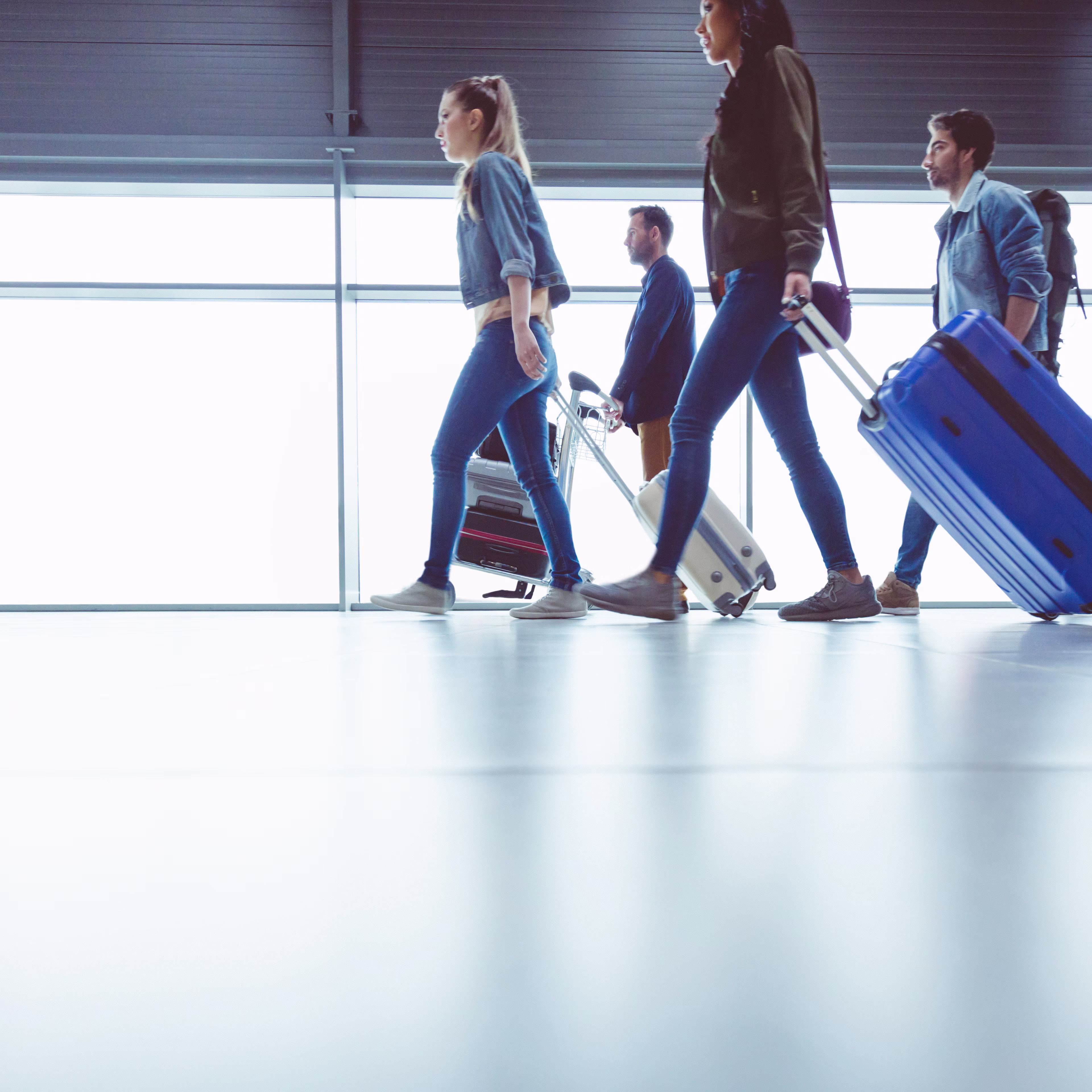 people-walking-with-suitcases