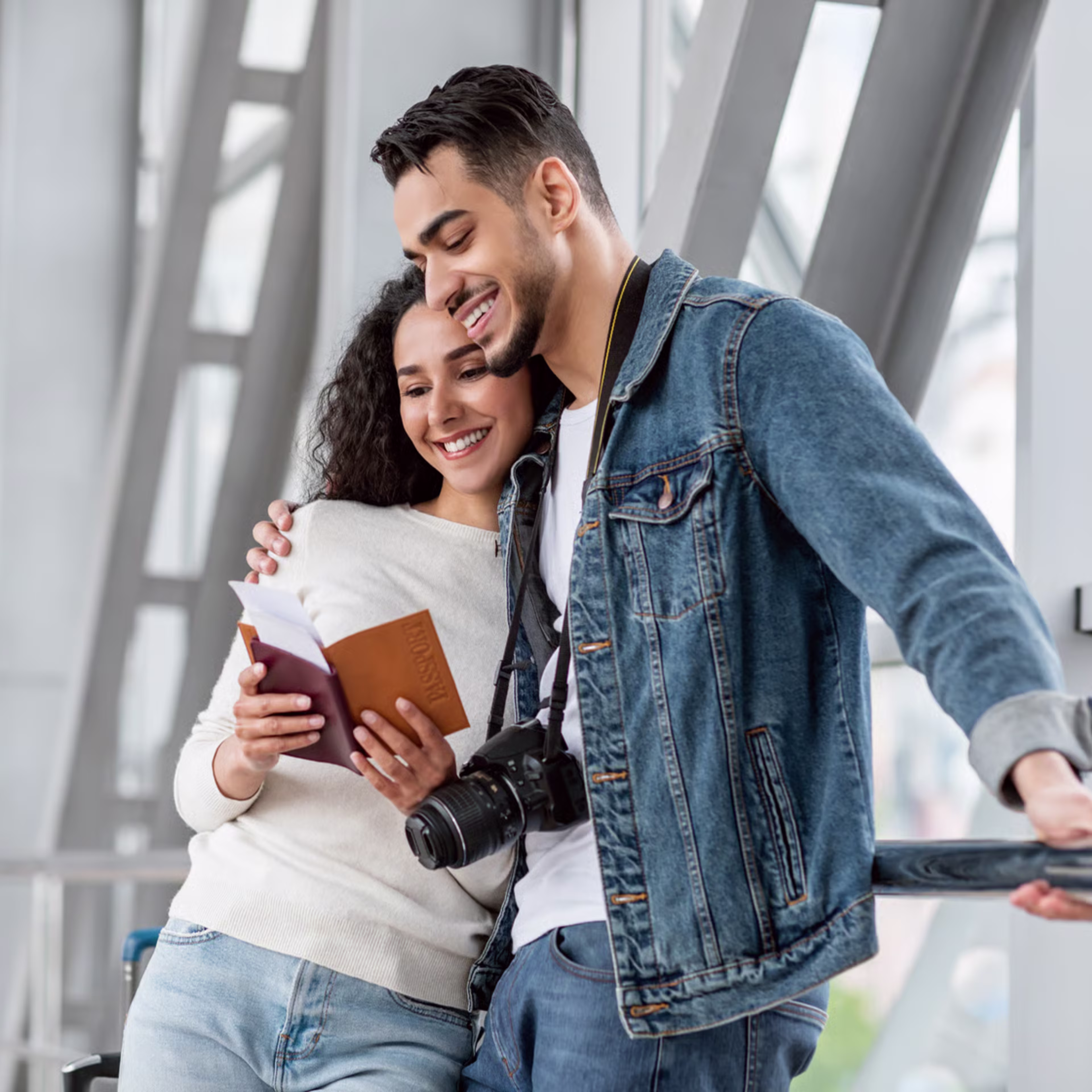 couple-looking-at-passport