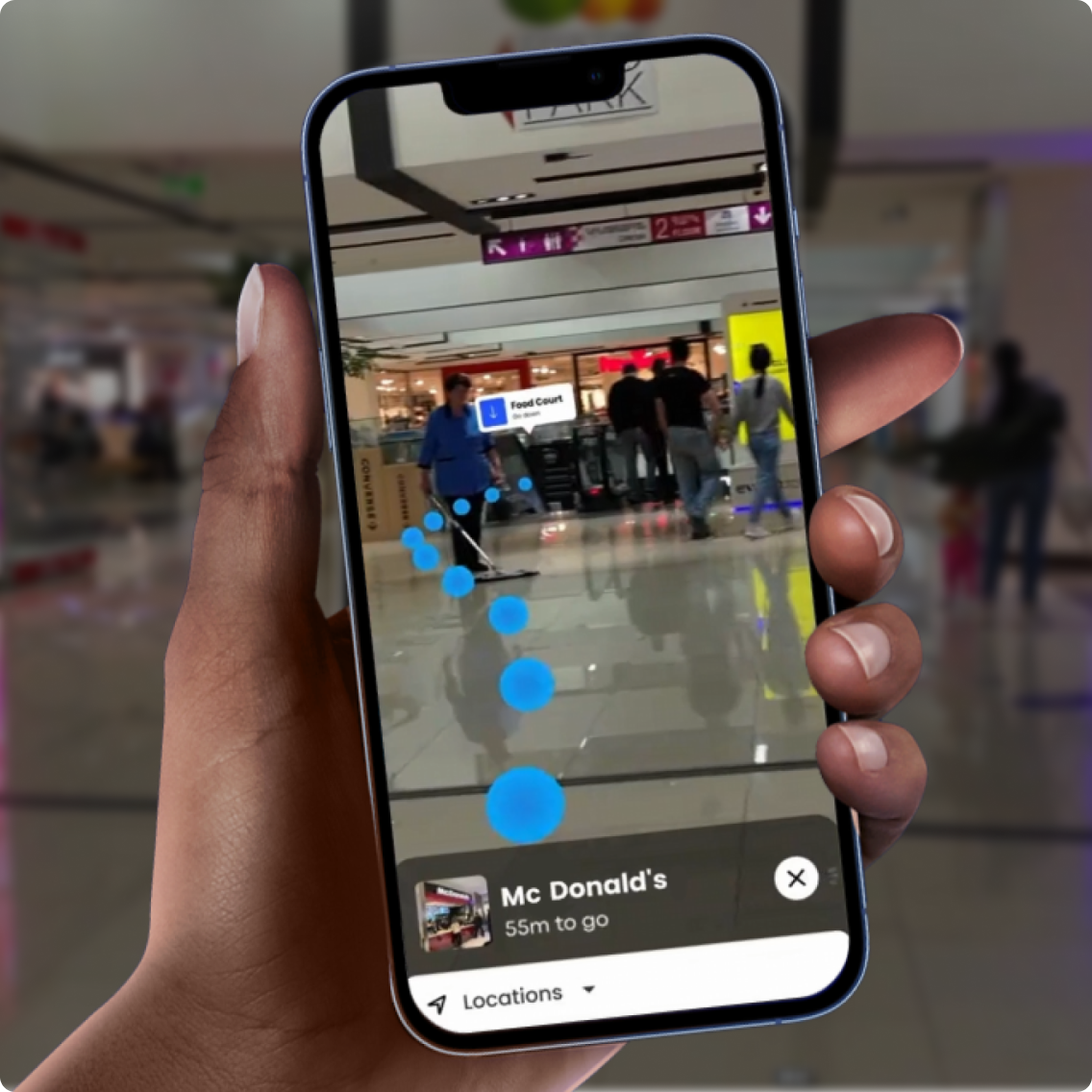 A person navigating through a mall using a Matterport space on a phone