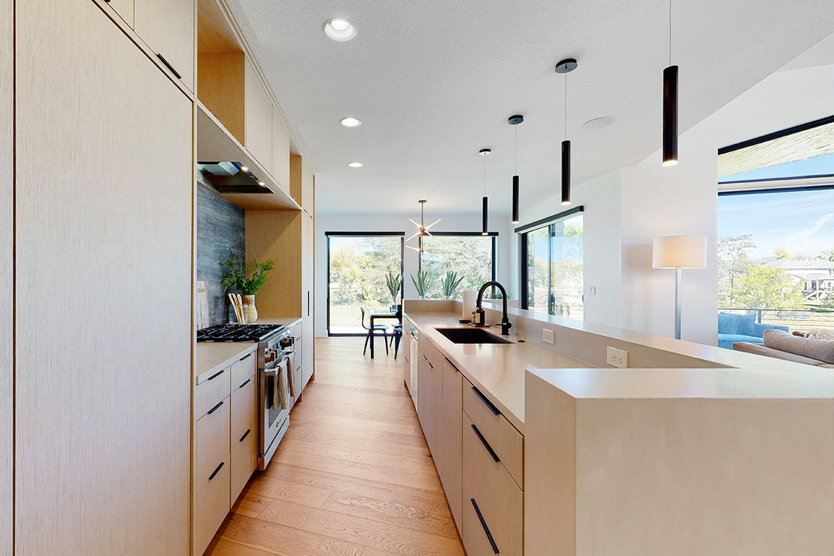 HDR photo of kitchen with sleek wooden cabinets