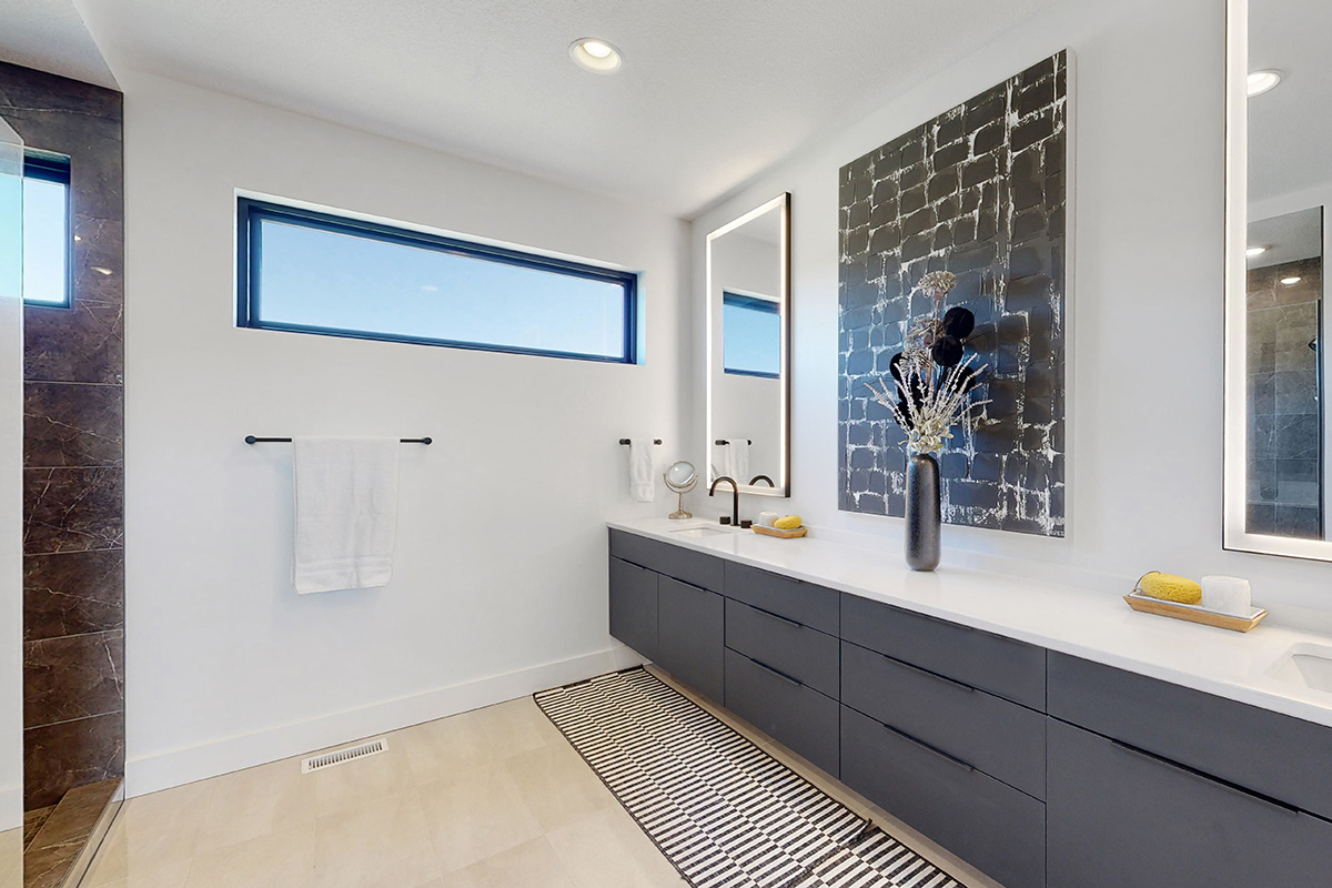 HDR photo of bathroom with white counters and dark cabinets