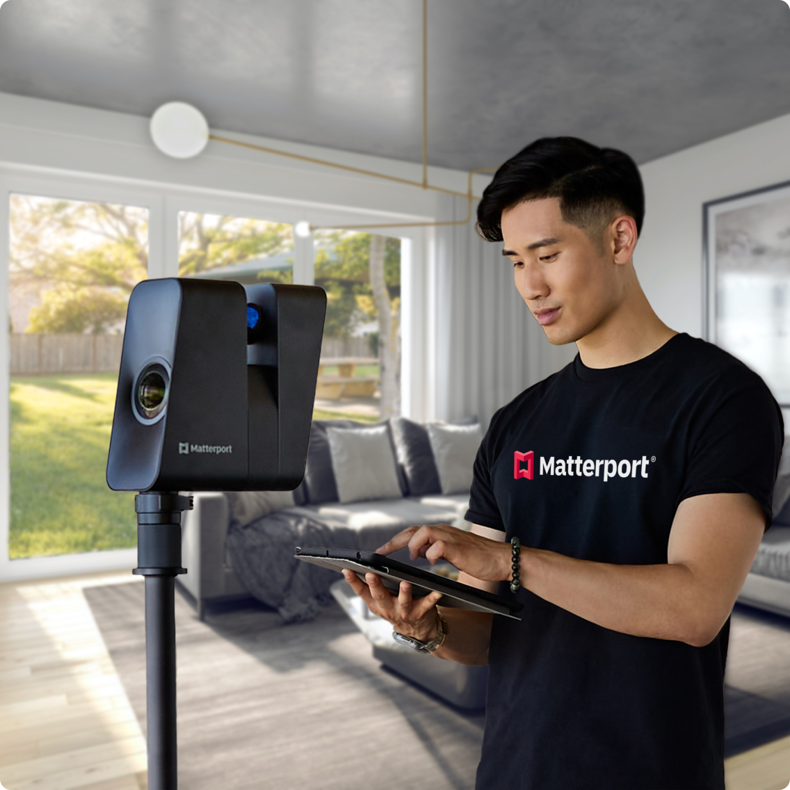 A man scanning a home with a Matterport Pro3 camera