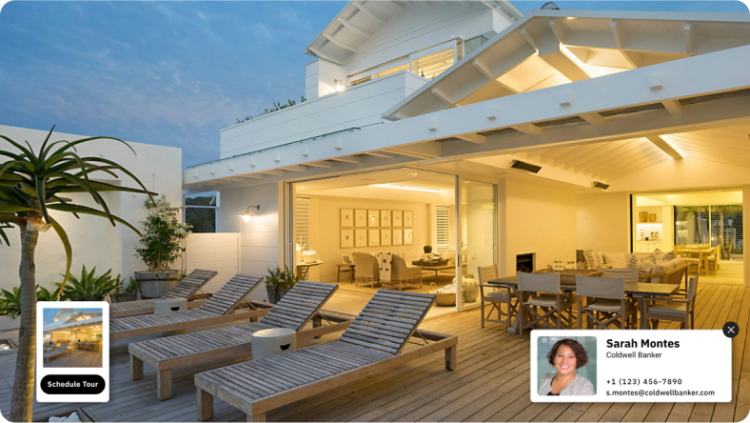 Une belle terrasse avec la carte de visite d’un agent immobilier dans le coin de l’écran