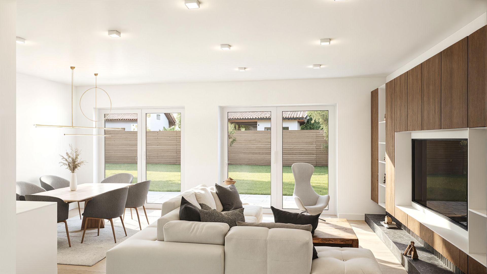Helles Wohnzimmer mit Sofa, Essbereich, großen Fenstern und Blick in den Garten.