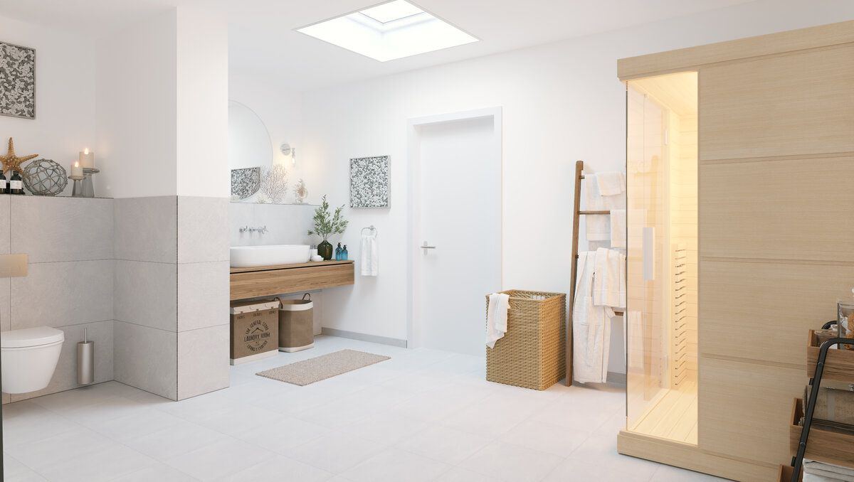 Modernes Badezimmer mit großer Dusche, Waschtisch, Toilette, Sauna und Dachfenster.