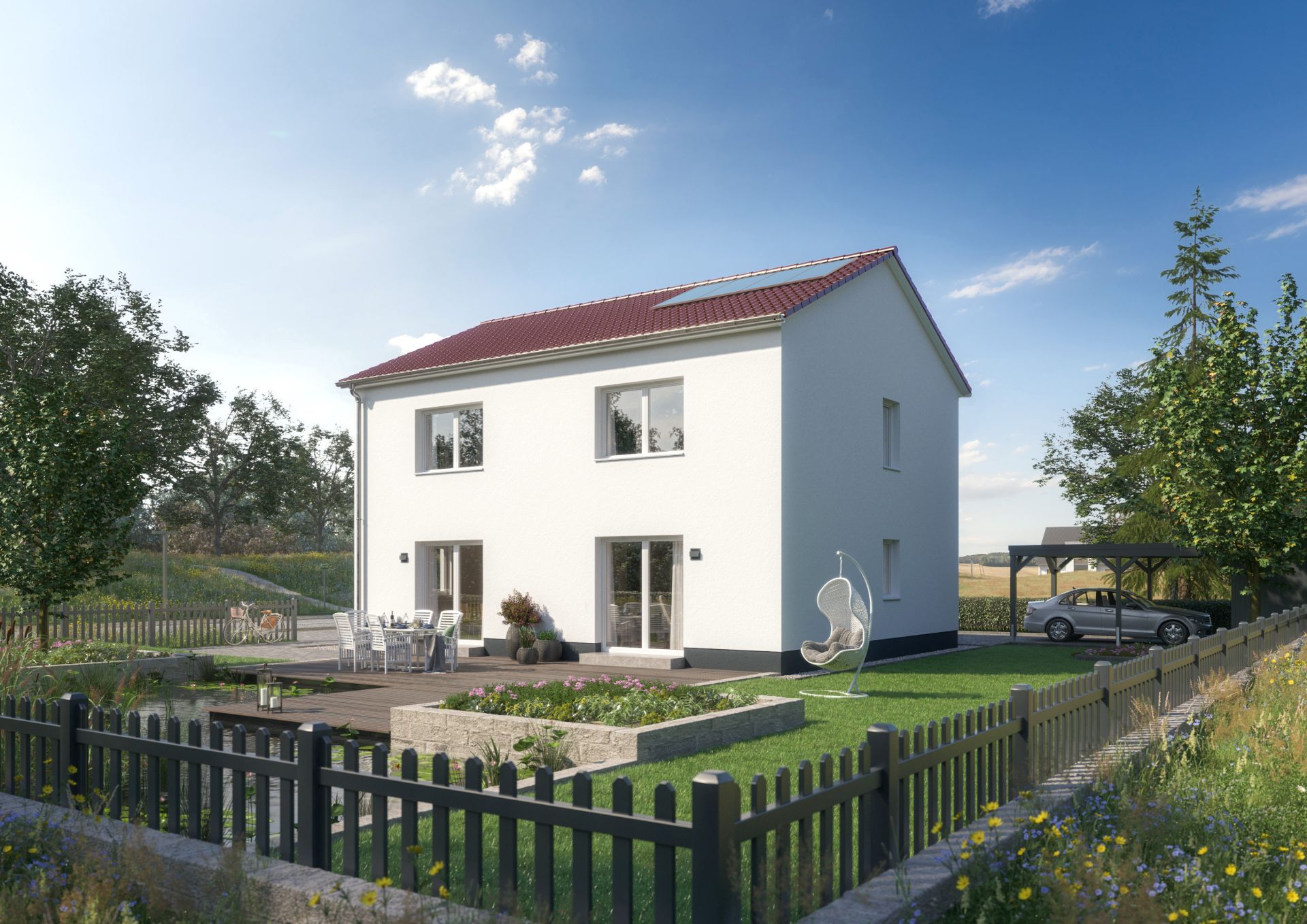 Zweistöckiges weißes Wohnhaus mit Garten, Terrasse, Gartenmöbeln und Zaun.