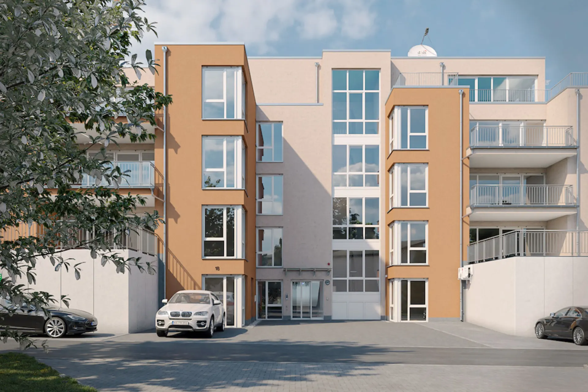Moderne Wohnhausfassade mit großen Fenstern und geparkten Autos davor.
